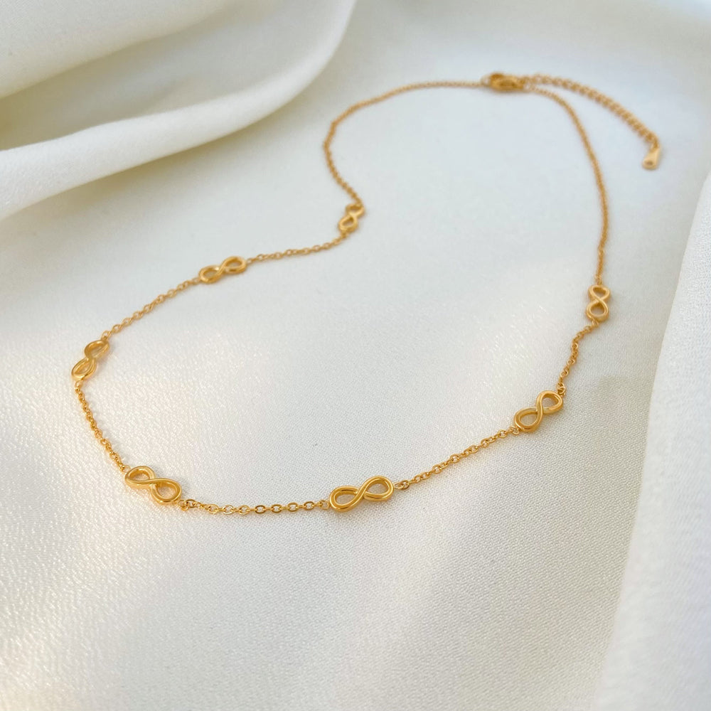 "Ellie” bow chain